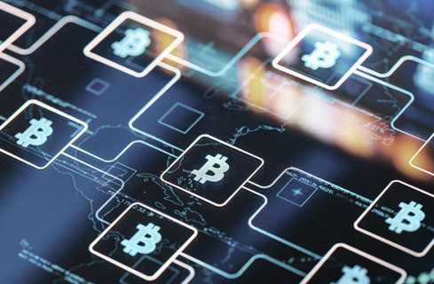 Illustration of digital connections with the Bitcoin icon between them