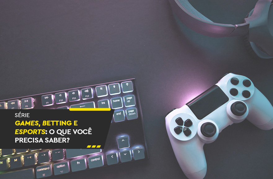 Visão superior de teclado preto com led, ao lado de controle de videogame nas cores branco e preto