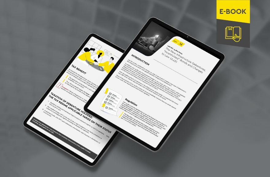 Mockup ilustrativo de dois tablets, um acima do outro, com imagens do conteúdo interno do e-book. No canto superior direito, faixa descritiva nas cores amarelo e cinza, com o nome "e-book" escrito