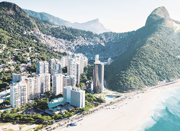 Top view of the city of Rio de Janeiro, overlooking some buildings by the sea, surrounded by mountains and trees